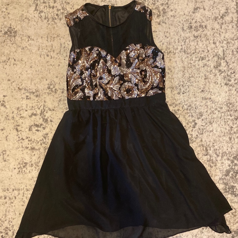 Black sequin halter dress.
